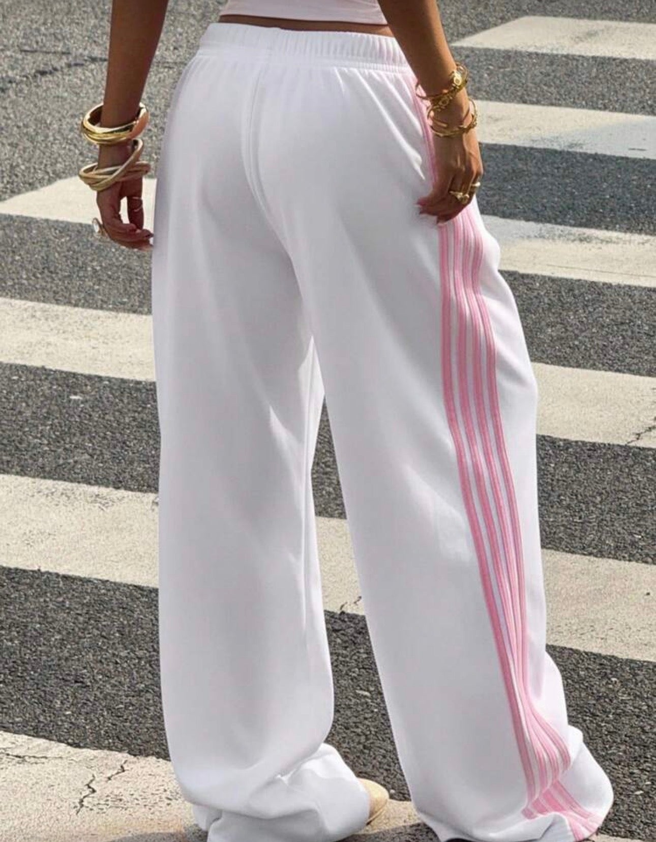 Muchica Women's White Striped Knitted Sweatpants Extra Long Straight
Leg Pink Side Stripe Loose Fit Casual Track Pants For Everyday Wear White Beach Pants White Wide Leg Pants Women Wide Pants Wide Leg Summer Pants Palazzo Pants Women White Track Pants Wo
