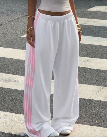 Muchica Women's White Striped Knitted Sweatpants Extra Long Straight
Leg Pink Side Stripe Loose Fit Casual Track Pants For Everyday Wear White Beach Pants White Wide Leg Pants Women Wide Pants Wide Leg Summer Pants Palazzo Pants Women White Track Pants Wo